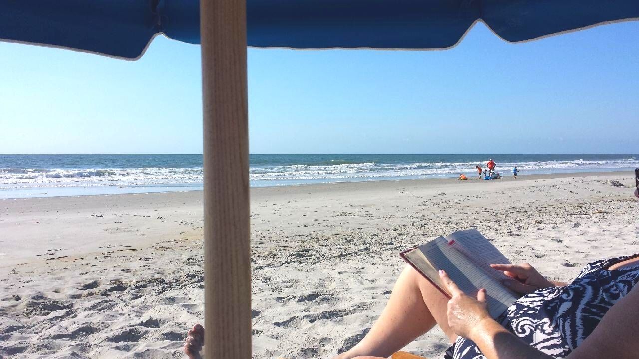 Reading-a-Book-on-the-Beach.jpg