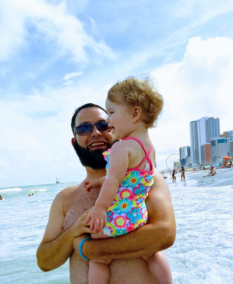 Father and daughter on the beach in Myrtle Beach,SC