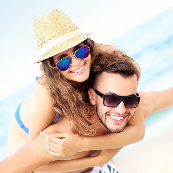 Couple on the beach having fun