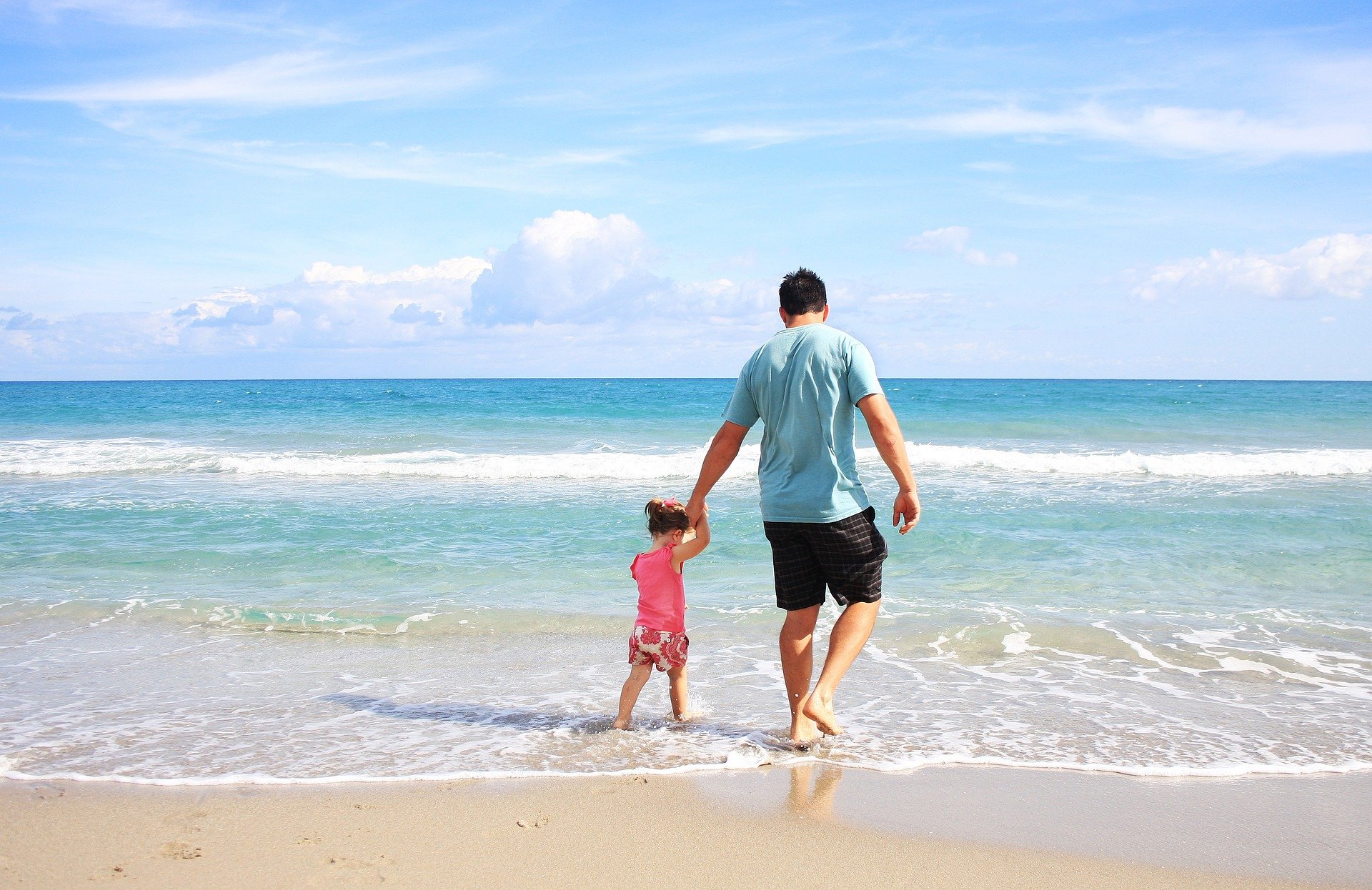 Father and son on the beach while in Myrtle Beach,SC