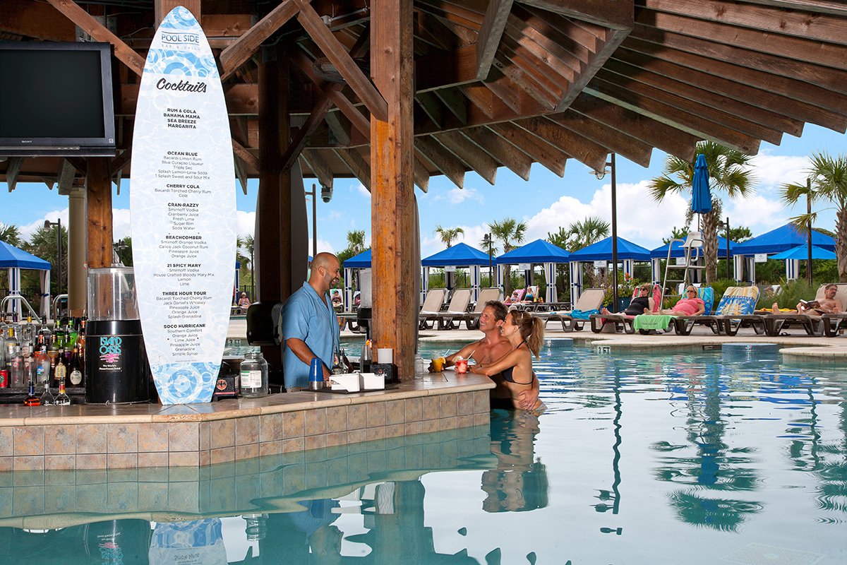 Ordering Drinks At The North Beach Rentals Pool Bar