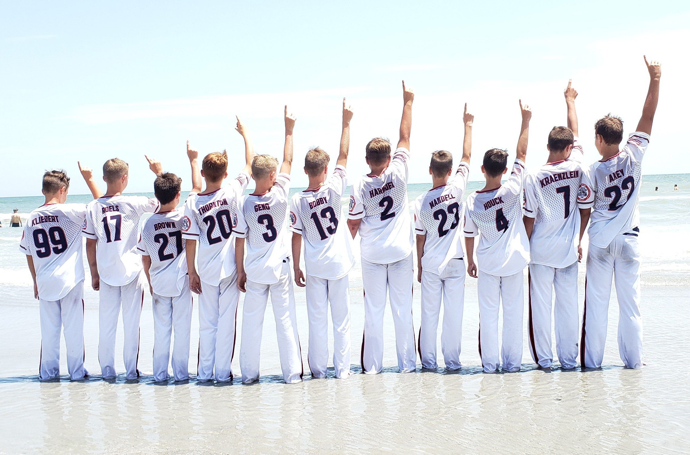 ocean-reef-baseball-team-on-beach-1.jpg