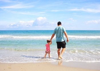 Father and son on the beach while in Myrtle Beach,SC