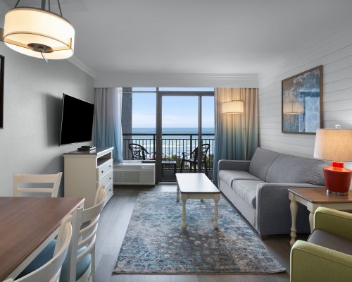grande-cayman-handicap-oceanfront-1-king-living-room